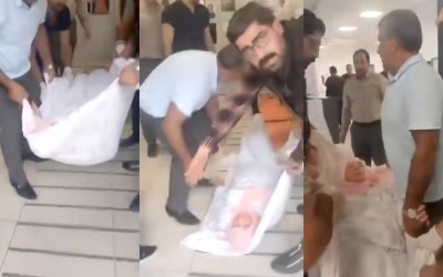 Ambulans Verilmeyince Eşini Battaniyeye Sarıp Taşıdı